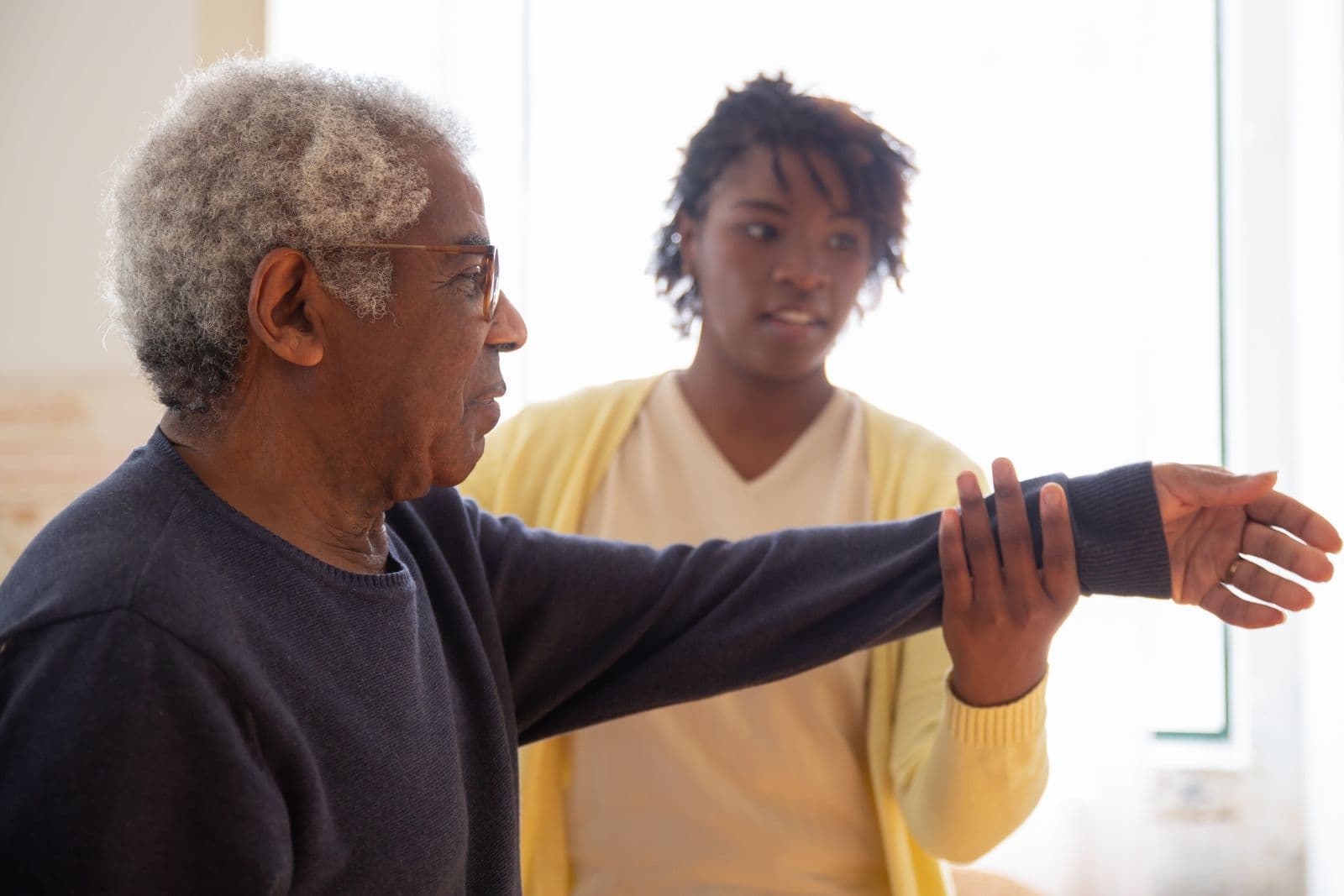 Patient receiving supportive at-home care assistance