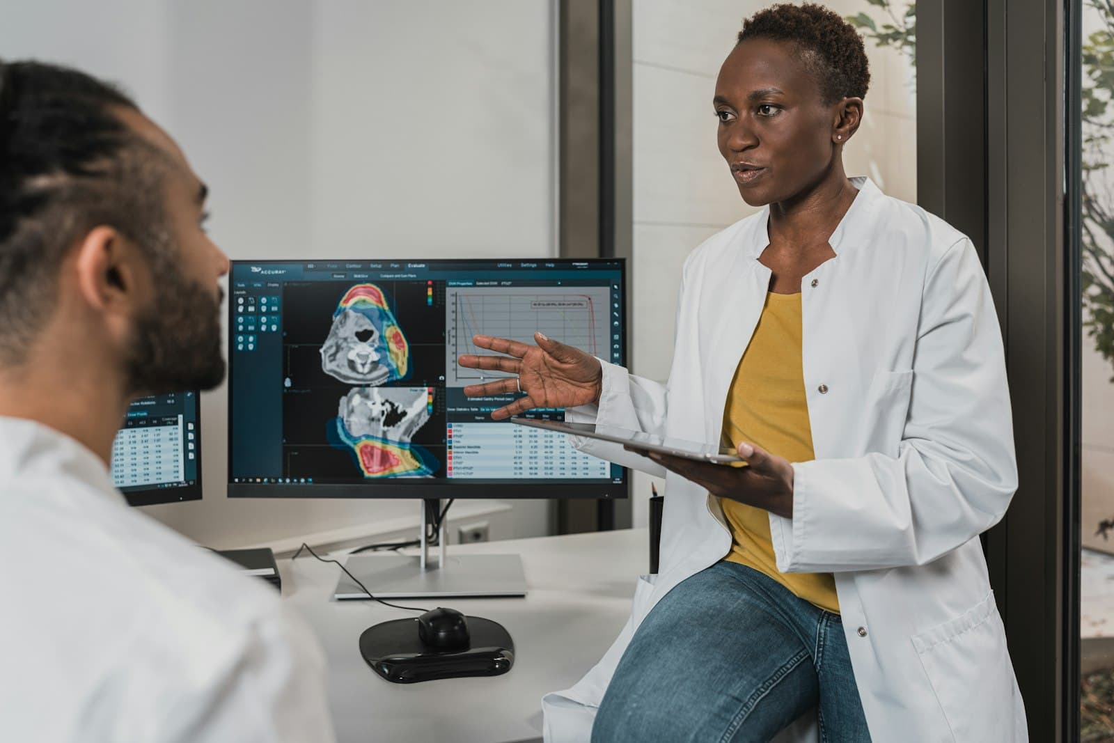 Healthcare providers reviewing clinical information together